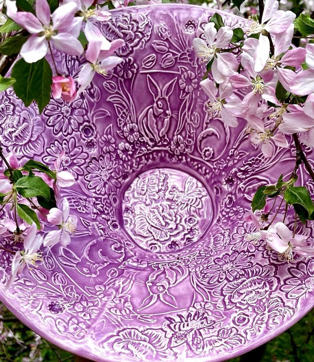 amethyst plant in a decorative bowl on a dining table